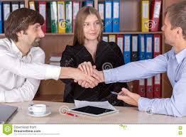 3 people shaking hands